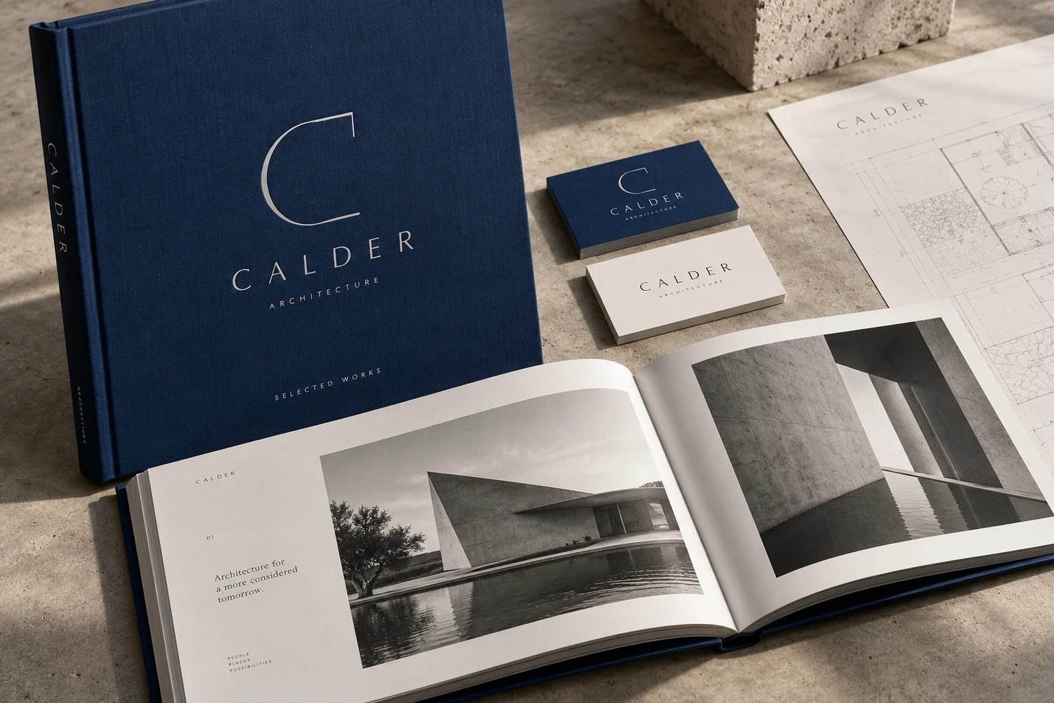 Calder deep blue architecture monograph, open project book, drawing sheet and business cards